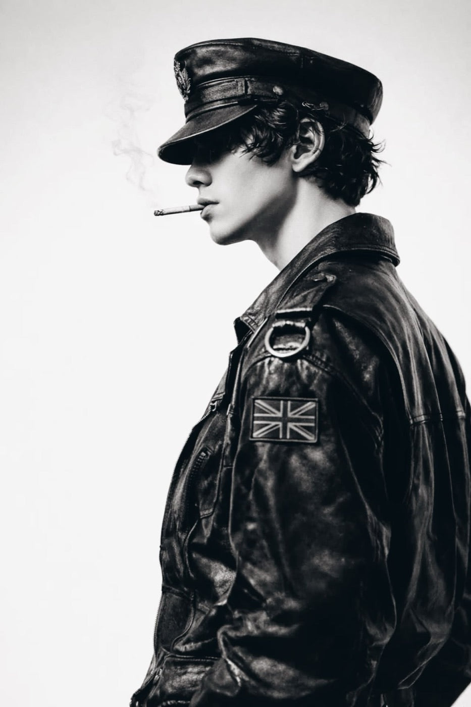 Portrait in profile, leather and smoke