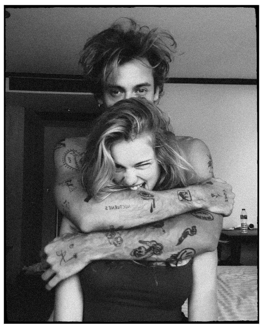 Intimate, embracing and laughing